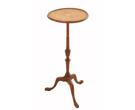 A mahogany tripod table, the circular top with inlaid decoration, raised on a slender turned column to three scroll feet, dia