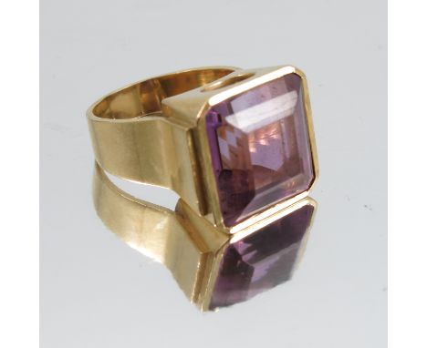 An amethyst single stone ring, stamped '18ct', the stone approximately 1.5cm square, finger size R, 15g grossCondition Report