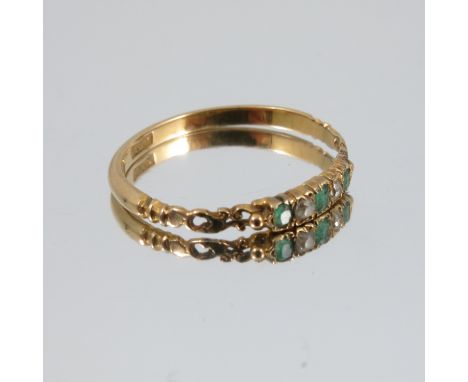 A Victorian emerald and diamond five stone ring, with open work shoulders, stamped '18ct', finger size Q, 1.7g gross