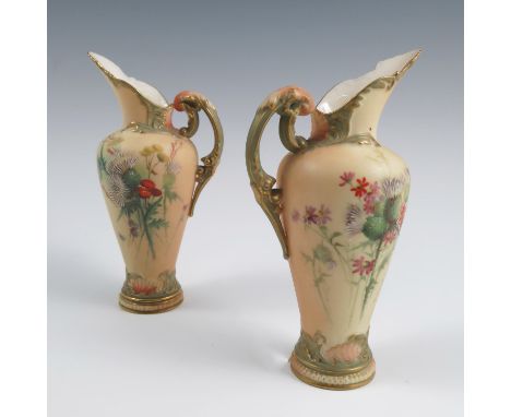 A pair of Royal Worcester blush ivory ewers, decorated with thistles and flowers, shape number 1587, dated 1900, height 6insC