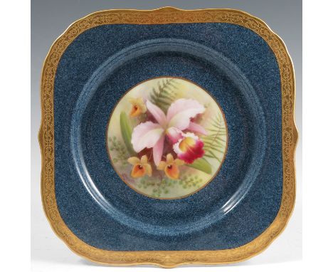 A Royal Worcester plate, decorated with a central panel of orchids by Albert Shuck, circa 1926, with a Sabrina blue and gilt 