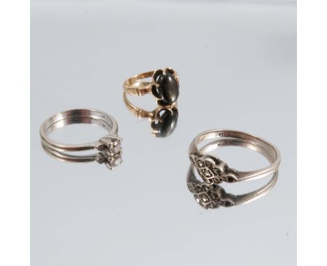 An 18ct gold stone set ring, together with two other rings