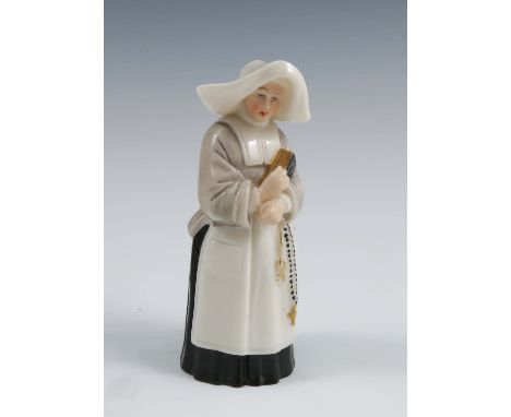 A Royal Worcester figure, of a nun, circa 1875, height 3.75insCondition Report:  Condition commensurate with age and wear and