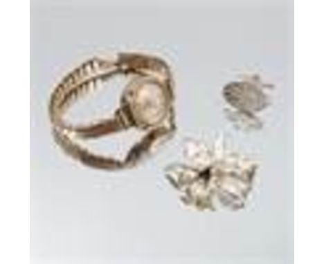 Zephyr, a lady's 9 carat gold mechanical wrist watch, on a metal expanding bracelet, together with one silver cufflink and an