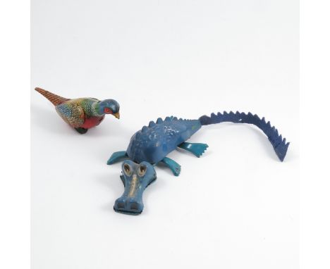 A GES&nbsp;Gesch tin plate toy, of a clock work pheasant, with key, together with a Tri-Ang Minic Jabberwock and other toys