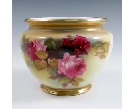 A Royal Worcester small jardiniere, decorated to the front with roses by K H Blake, shape number H132, dated 1918, height 5.2