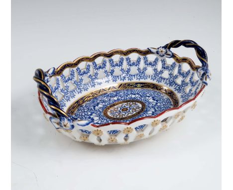 A 19th century Royal Worcester oval sweet meat dish, with pierced border, rope twist handles, decorated in the Royal Lily pat