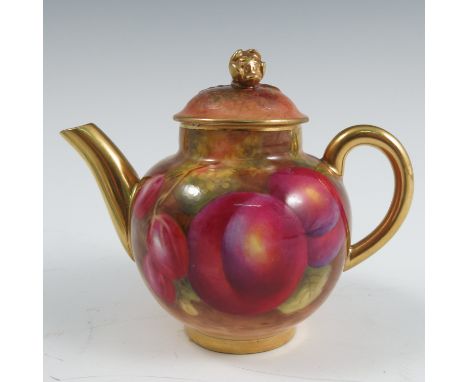 A Royal Worcester miniature tea pot, decorated all around with hand painted fruit by Harry Ayrton, circa. 1958, height 3.25in