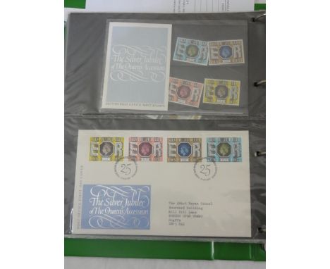 Two albums of predominantly British stamps including commemorative First Day Covers and Mint Stamps plus various definitive s