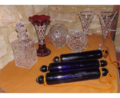 A trio of antique cobalt blue glass rolling pins, one bearing label for Bristol Blue Glass, together with a Victorian ruby gl