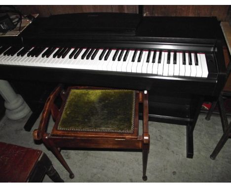 A Yamaha electric piano together with an Edwardian piano stool with shallow box seat and inlaid Art Nouveau style decoration