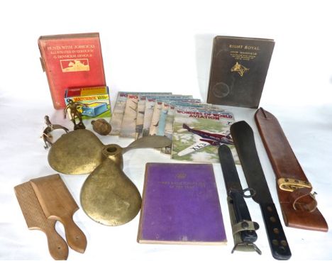 A miscellaneous collection to include a heavy brass boat rudder, a 20th century military machete set within a leather scabbar