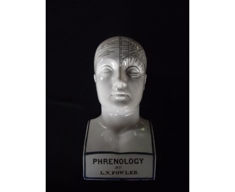 A ceramic phrenology bust by L N Fowler script to sides reading L N Fowler, 107 Fleet Street, London, also reading Entered at