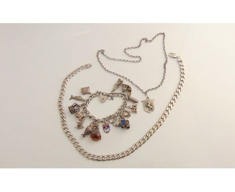 A sterling silver charm bracelet, suspended with fifteen various charms, with heart-shaped padlock clasp; a sterling silver f