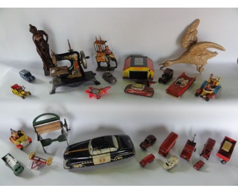 A boxed miscellaneous collection to include ceramic wall plaque in the figure of a duck in flight, vintage toys to include a 
