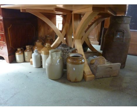 A quantity of vintage stoneware flagons and jars of varying capacity, one with printed merchant's mark for T&E Taylor, togeth