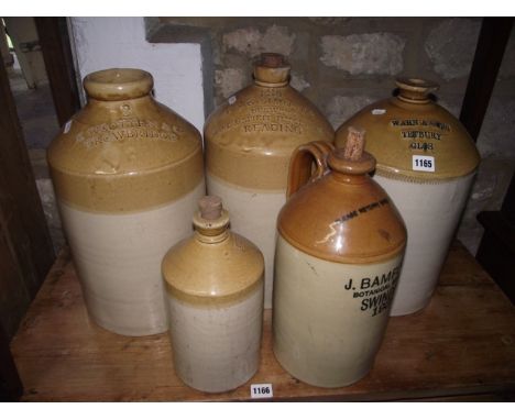 Five vintage stoneware flagons and jars, three with impressed merchants marks for Warn & Sons, Tetbury, Glos, H & G Simonds B