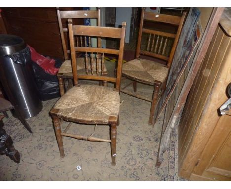 A set of six Edwardian stained beechwood cottage dining chairs with rush seats and turned spindle backs together with a selec