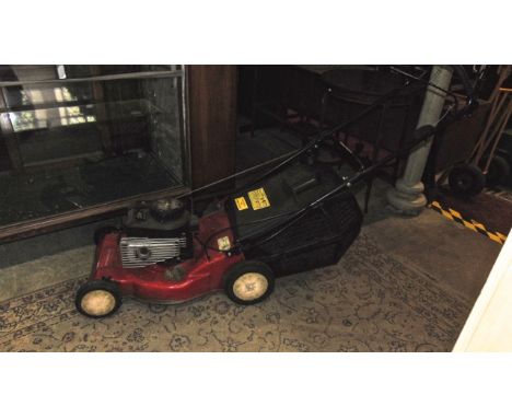 A Sovereign self propelled petrol rotary lawn mower with Briggs & Stratton engine