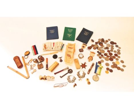 A miscellaneous collection to include a leather cased folding ruler, a silver mounted cheroot holders to include a silver med