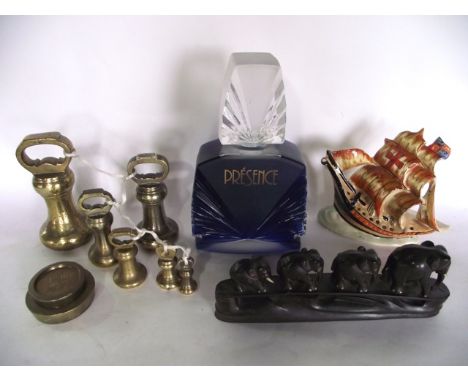 A graduating set of six 19th century brass bell weights ranging from 7 lb to 4 oz plus two further weights, an Arthur Wood Ar