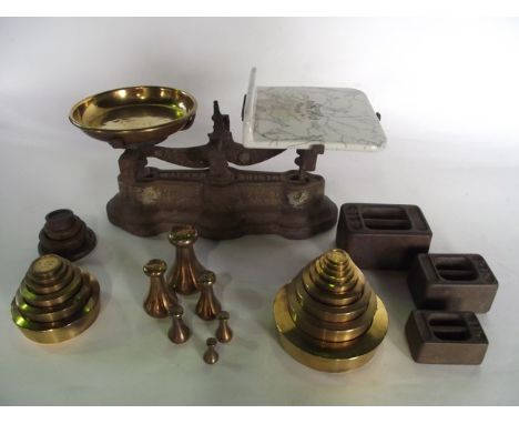 An assembly of antique domestic scales with simulated marble ceramic plate, marked H. Walker, scale maker, Bristol together w