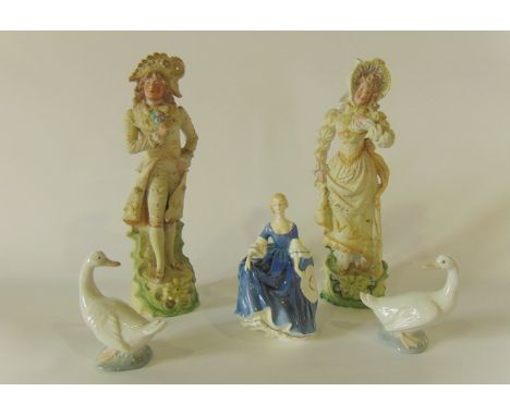 A pair of late 19th century continental bisque figures of a lady and gentleman in late  18th century style costume together w