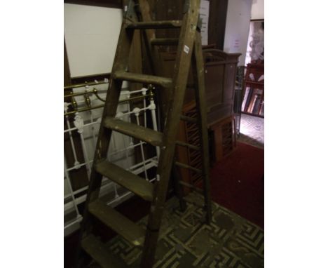 A vintage pine extending ladder and a further pine folding clothes airer