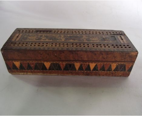 A 19th century Tunbridgeware cribbage box, elaborately inlaid, grounded by birds eye maple veneer, the lid with micro floral 