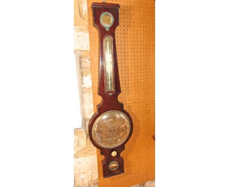 A mid 19th century mahogany wheel barometer with ebony banded borders and silvered dials marked Lombandini of Bristol