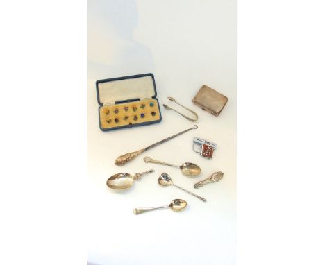 A cased set of twelve sterling silver and enamelled clips, each in the form of a different flower, the case marked "Zarger" a