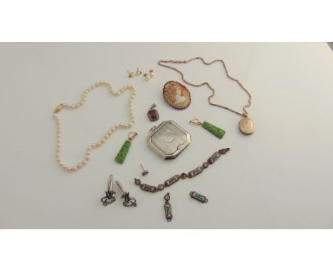 A gold-plated locket, of oval form, on a fancy link chain; a cameo brooch/pendant, with marcasite inset borders, in silver; a