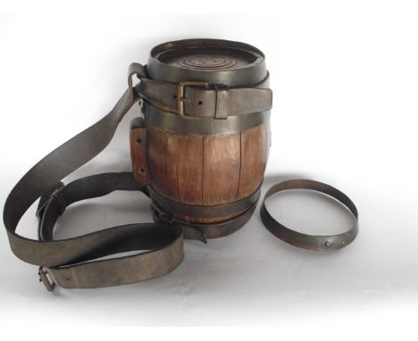 A good quality antique coopered oak spirit barrel with leather strapping, stamped to both ends V Radford Maker, 24 cm tall ap