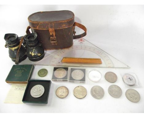 A collection of Crowns, mainly Elizabeth II, a pair of vintage binoculars and a WWII German military 180? compass