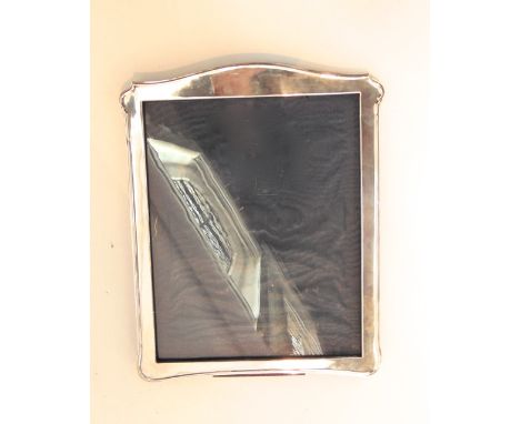 A George V silver easel back picture frame, A & J Zimmerman Ltd, Birmingham, 1918, of plain shaped rectangular form, 30cm hig