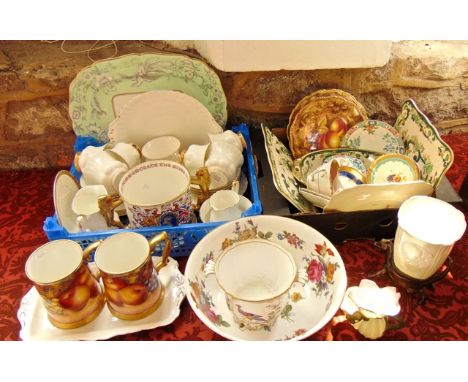 A pair of tankards in the Royal Worcester manner with fruit decoration, signed G Delaney and printed mark to base Hand Painte