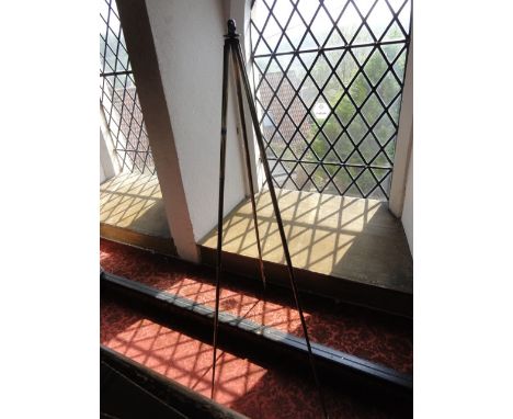 A vintage telescopic brass tripod, 132 cm tall approx