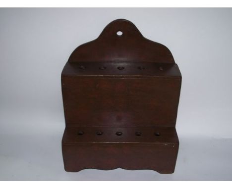 A wall hanging two divisional timber pipe rack with simulated oystered finish, 37 x 37 cm approx