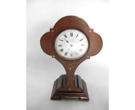 An Edwardian balloon shaped mantle clock with mother of pearl and satin wood inlay detail 