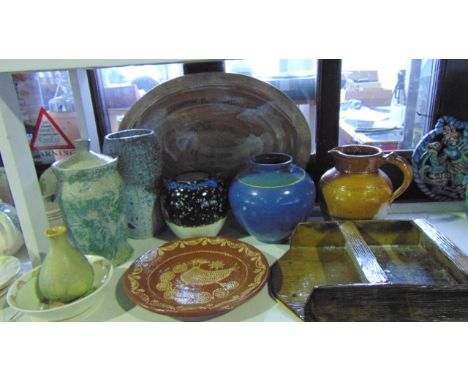 An interesting collection of Studio Pottery wares including a ceramic wall hanging rack with textured finish, an oval meat pl