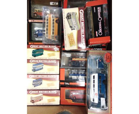 SIXTEEN ASSORTED 1/76 SCALE MODEL BUSES  each mint or near mint and boxed. 