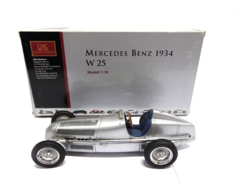 A 1/18 SCALE CMC NO.M033, MERCEDES-BENZ W25, 1934  silver, mint or near mint, boxed.