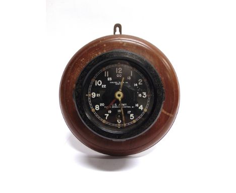 A SECOND WORLD WAR UNITED STATES ARMY AIR FORCE AIRCRAFT CLOCK  by the Chelsea Clock Co. of Boston, the black dial with white