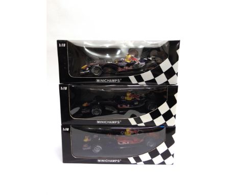 THREE 1/18 SCALE RED BULL FORMULA 1 RACING CARS  comprising a Minichamps Red Bull Racing Cosworth RB1 (D. Coulthard); Minicha