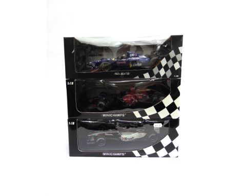 THREE 1/18 SCALE FORMULA 1 RACING CARS  comprising a Paul's Model Art Ligier Honda JS41 (O. Panis); Minichamps Torro Rosso Co