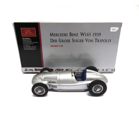 A 1/18 SCALE CMC NO.M018, MERCEDES-BENZ W165, 1939  silver, mint or near mint, boxed.