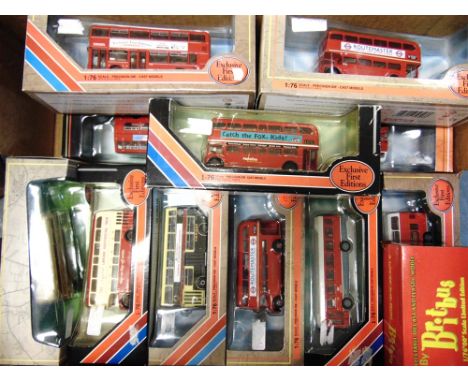TWELVE 1/76 SCALE MODEL BUSES  of London interest, each mint or near mint and boxed. 