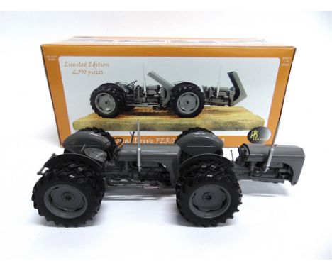 A 1/16 SCALE UNIVERSAL HOBBIES DUAL DRIVE FERGUSON TED-40 TRACTOR  grey, mint or near mint and boxed.