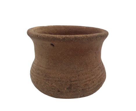 A Chinese Neolithic pot, with an incised lower body, height 8.5cm, diameter 11cm.&nbsp;