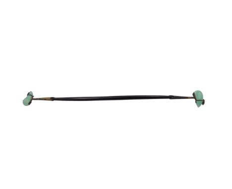 A Japanese black lacquered and jade hairpin, with Ying and Yang symbols, length 16.5cm.